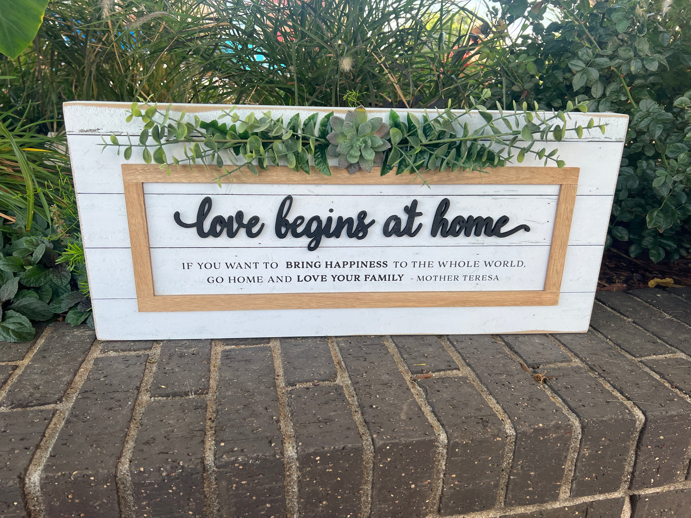 Wooden wall Sign with greenery